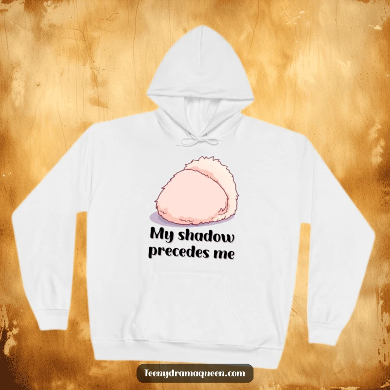 Funny hoodie depicting a dramatic, overly fluffy slipper casting a striking, exaggerated shadow, perfect for cozy, theatrical vibes.