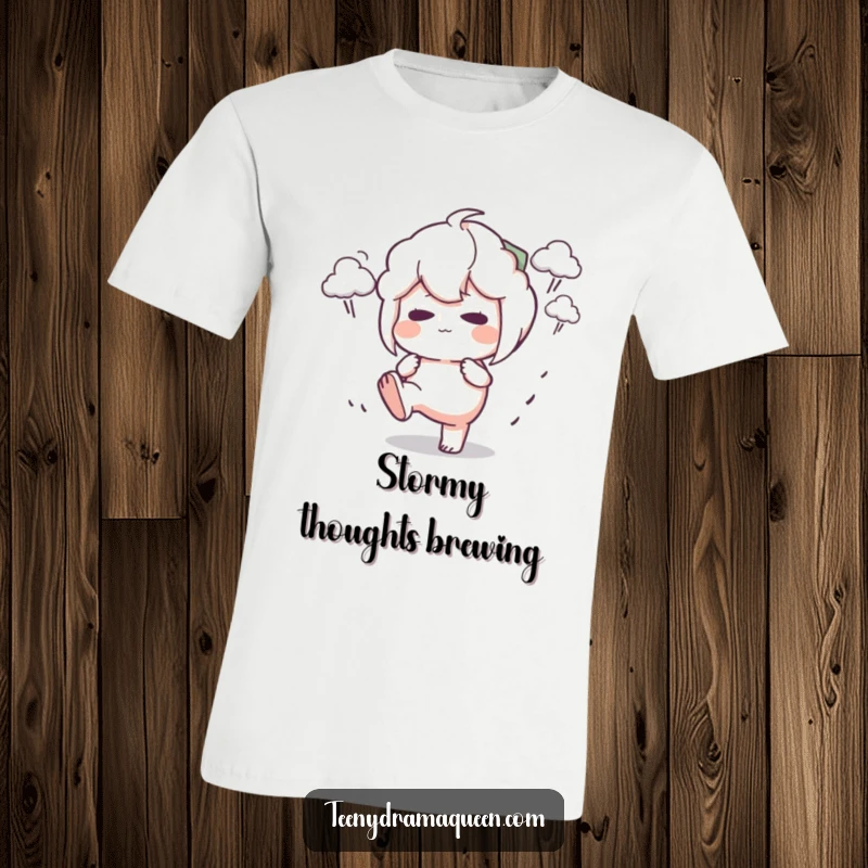 Funny T-Shirt of a character stomping its foot with a pout, surrounded by tiny dark clouds, embodying stormy displeasure.