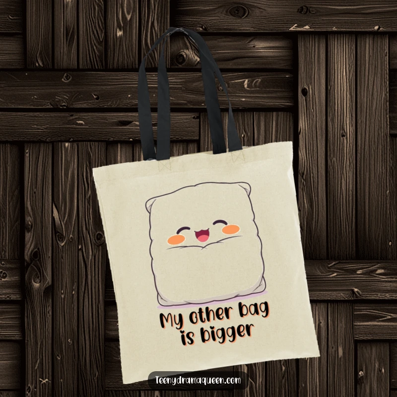 Funny tote bag showcasing a giggling, overstuffed pillow character in a comically large case, ready to carry your things with cheer.